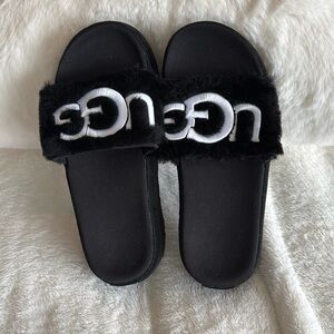 Black UGG slide brand new without tags or box. Size 7.